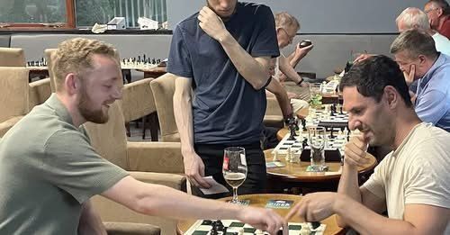Two members in the middle of a friendly game