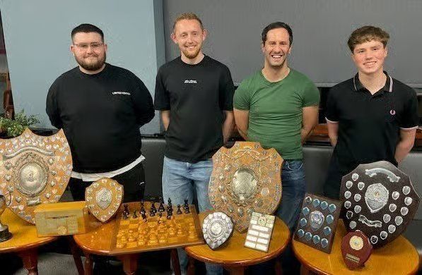 Kidderminster Chess Club members with the season's trophies